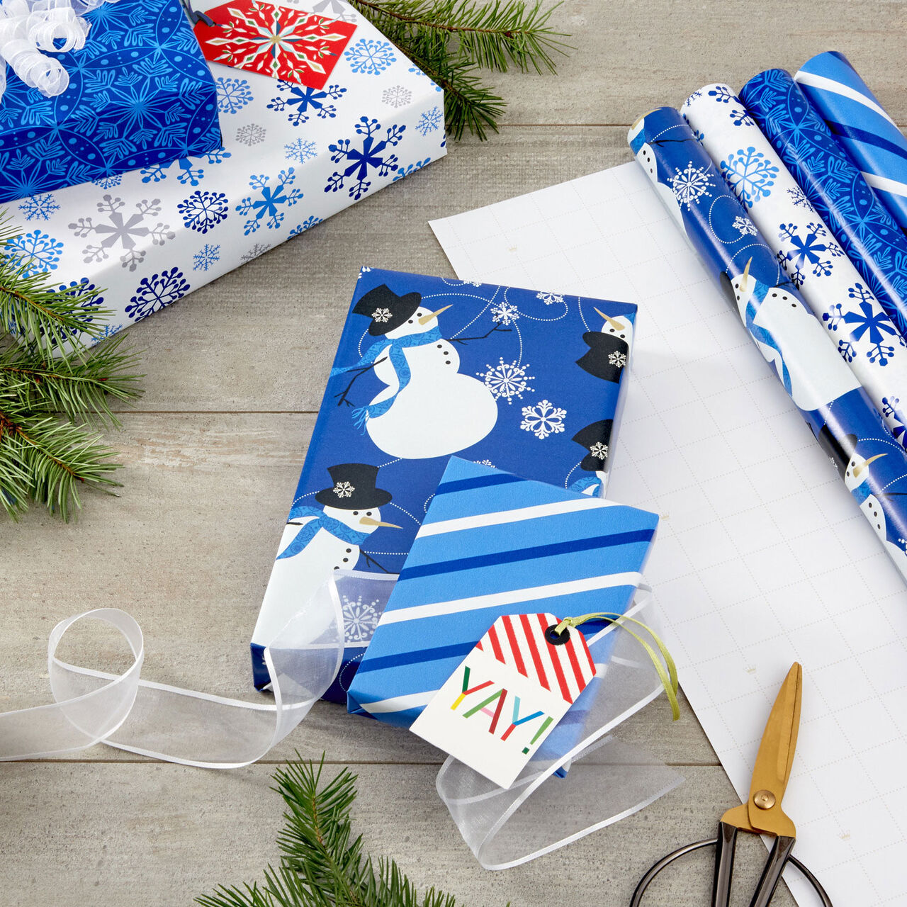 Winter Wonder 4-Pack Blue and White Wrapping Paper in use image number 1